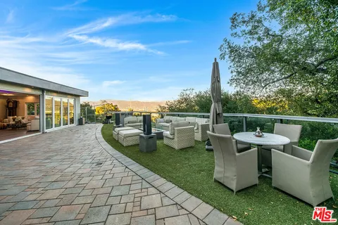 a view of a house with a swimming pool