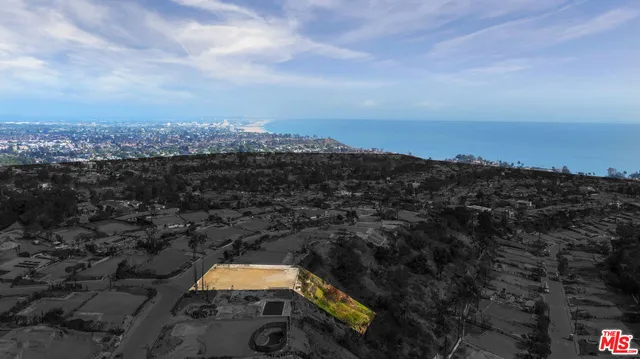 an aerial view of residential house with outdoor space