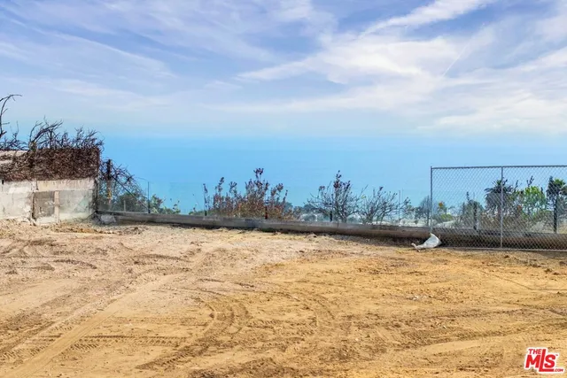 a bathroom with a sink and a shower curtain