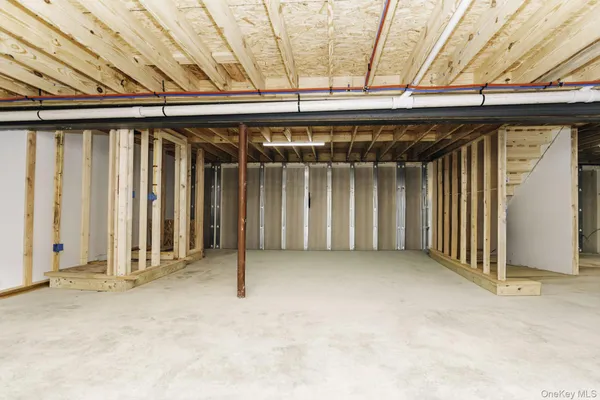 an empty room with wooden walls