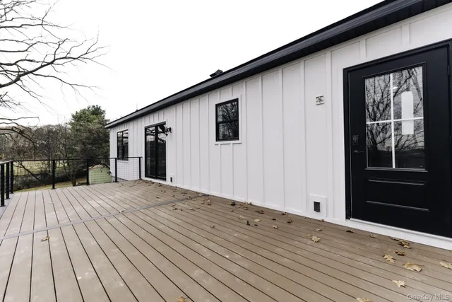 a view of outdoor space with wooden deck