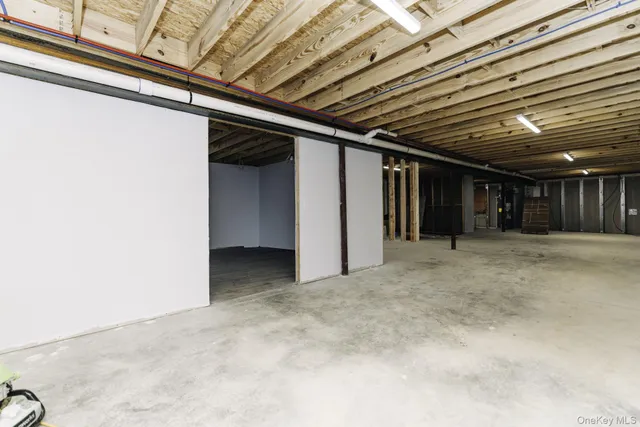 an empty room with wooden floor