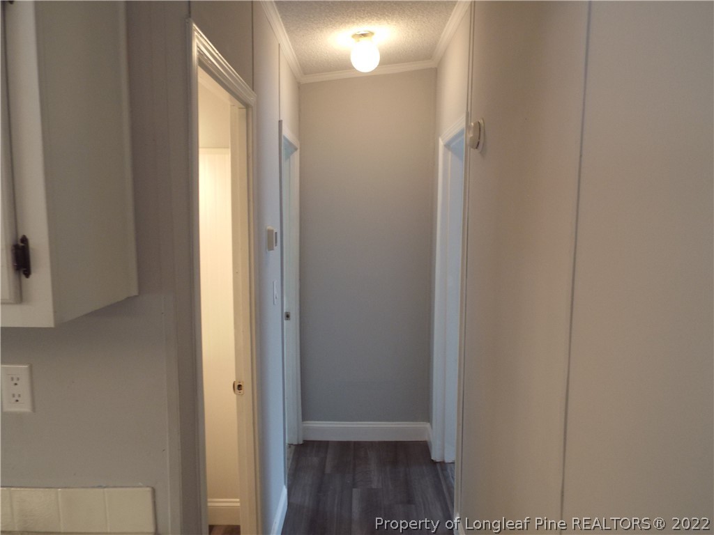 73 Georgia Way Cameron, NC 28326 - Photo 10 of 28 a view of a bathroom with wooden floor