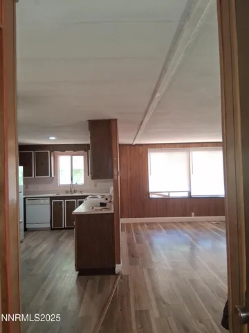 a living room with a couch furniture and a window