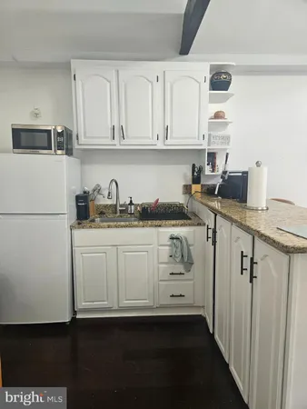 a bedroom with furniture