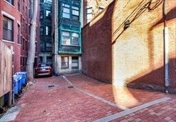 a view of a car park in front of building