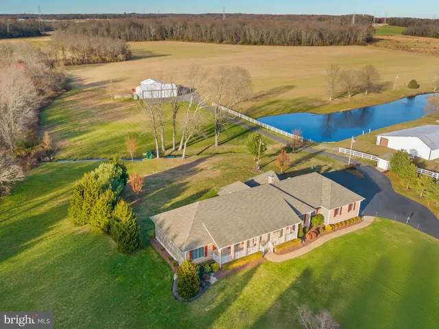 a view of a swimming pool with a lake view