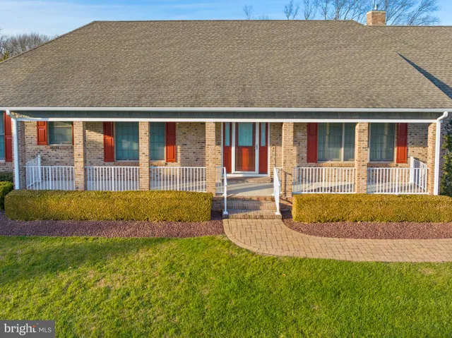 a view of a balcony with wooden floor