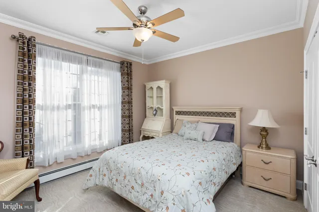 a front view of a house with swimming pool having outdoor seating