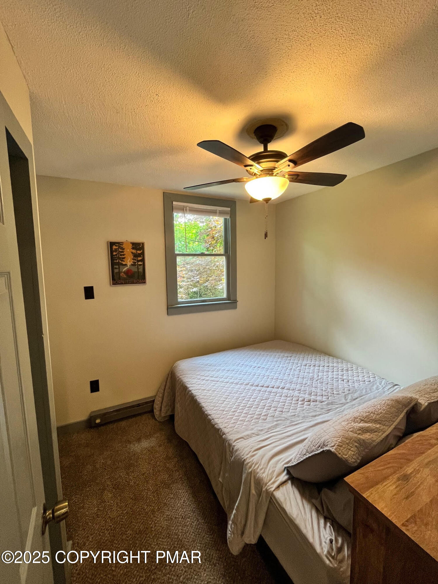 4 1st Street Hawley, PA 18428 - Photo 19 of 32 a bedroom with a bed and a window