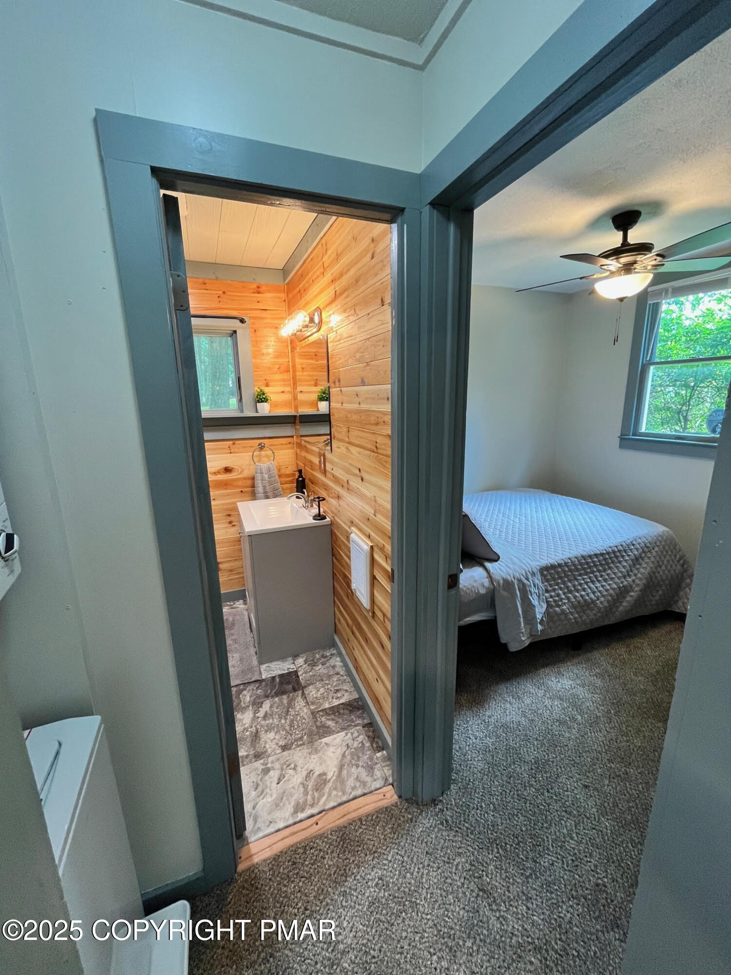 4 1st Street Hawley, PA 18428 - Photo 23 of 32 a bedroom with a bed and a window
