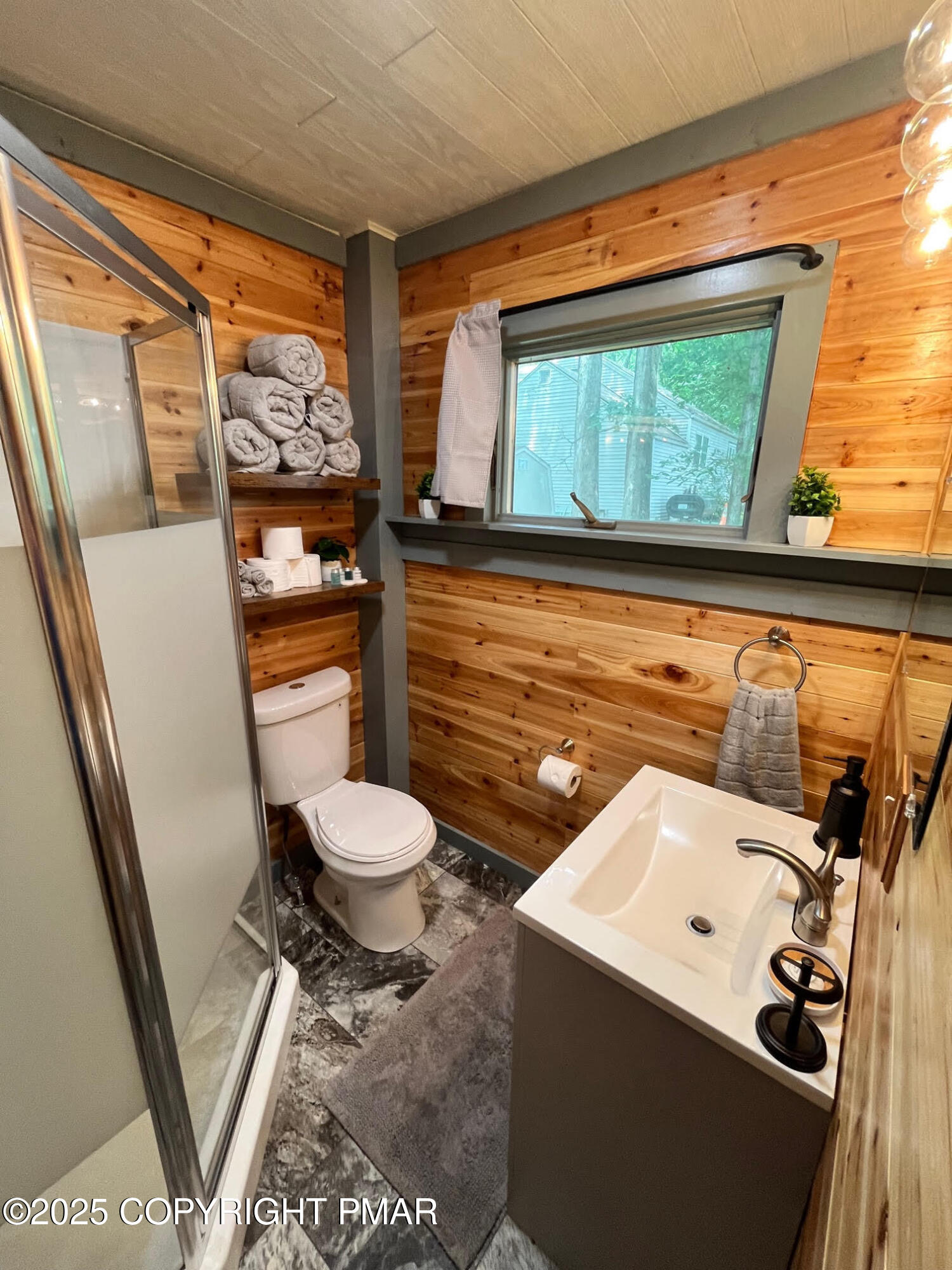 4 1st Street Hawley, PA 18428 - Photo 27 of 32 a bathroom with a toilet a sink and a shower