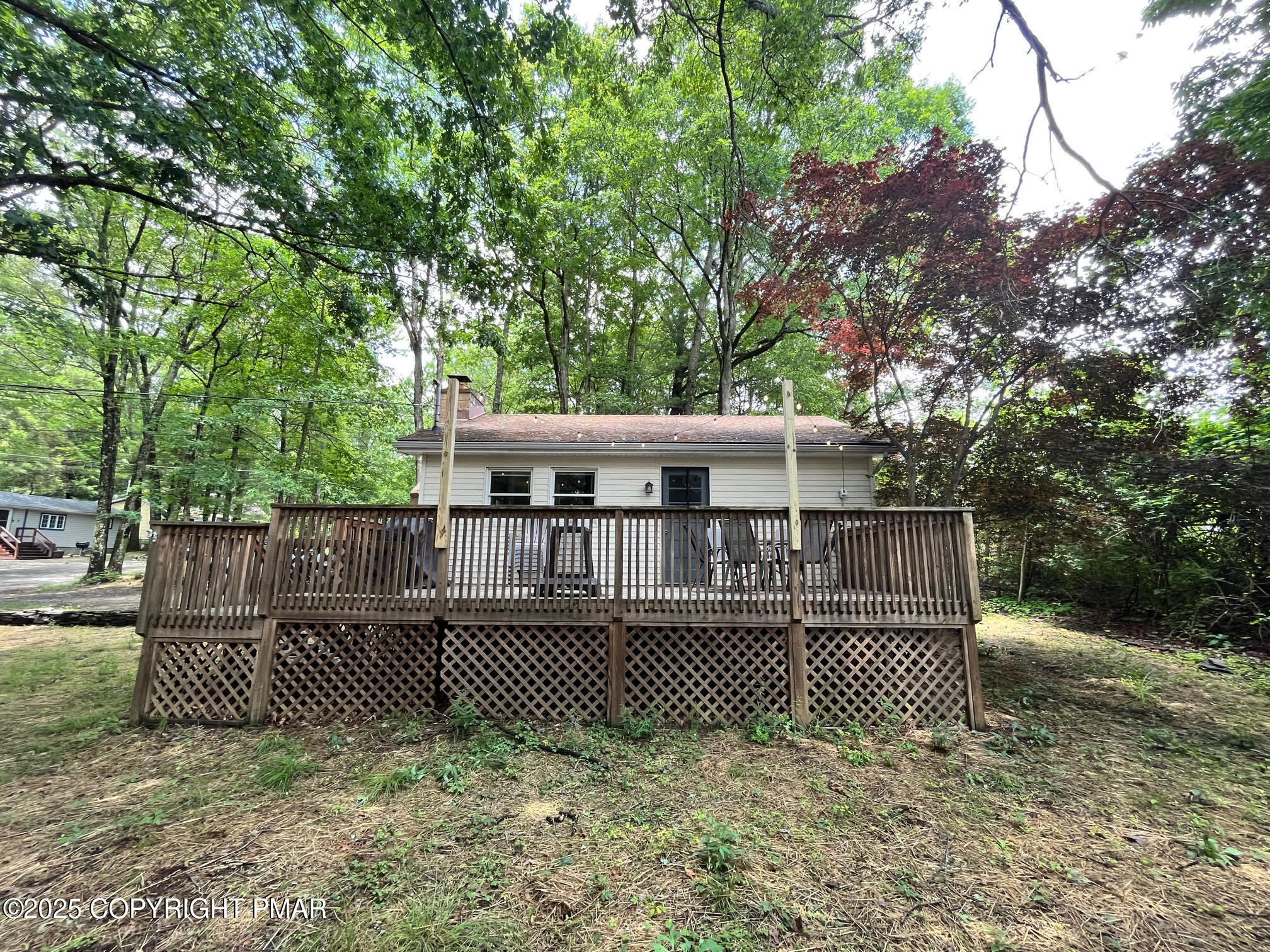 4 1st Street Hawley, PA 18428 - Photo 3 of 32 a view of a roof deck with wooden fence and floor