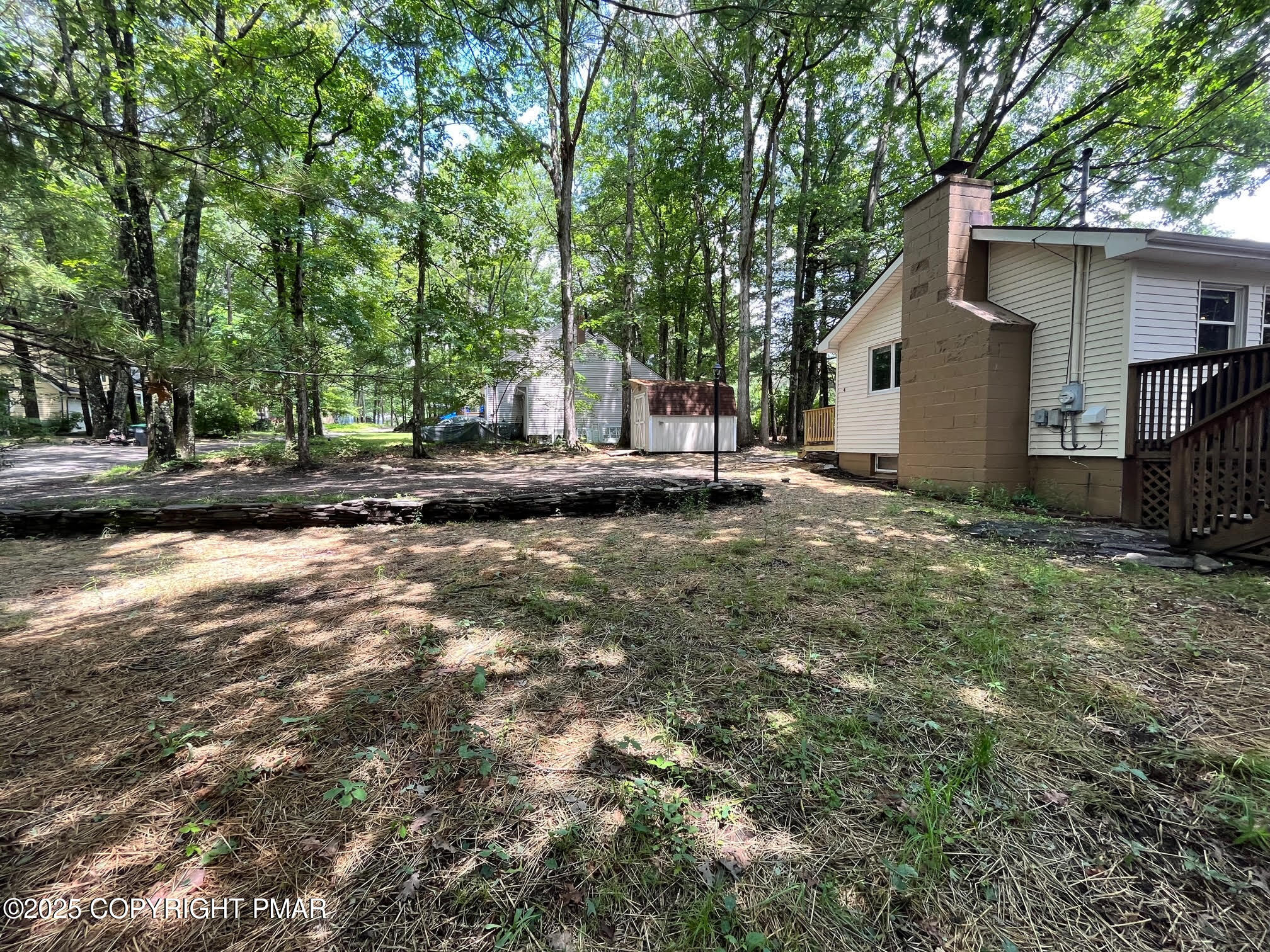 4 1st Street Hawley, PA 18428 - Photo 7 of 32 a view of a house with a yard