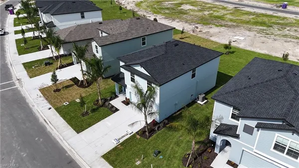 an aerial view of a house with a garden