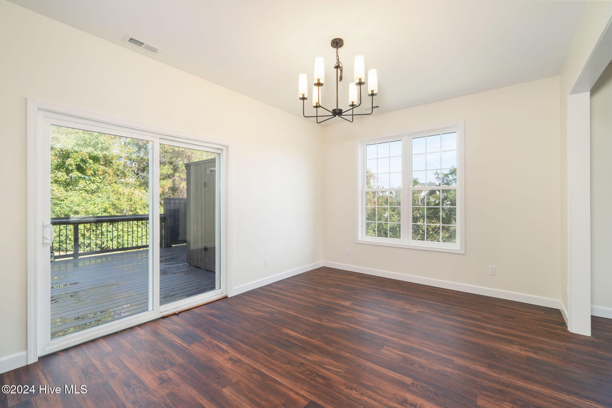 1602 Razorbill Court Morehead City, NC 28557 - Photo 17 of 62 Back deck access from dining area
