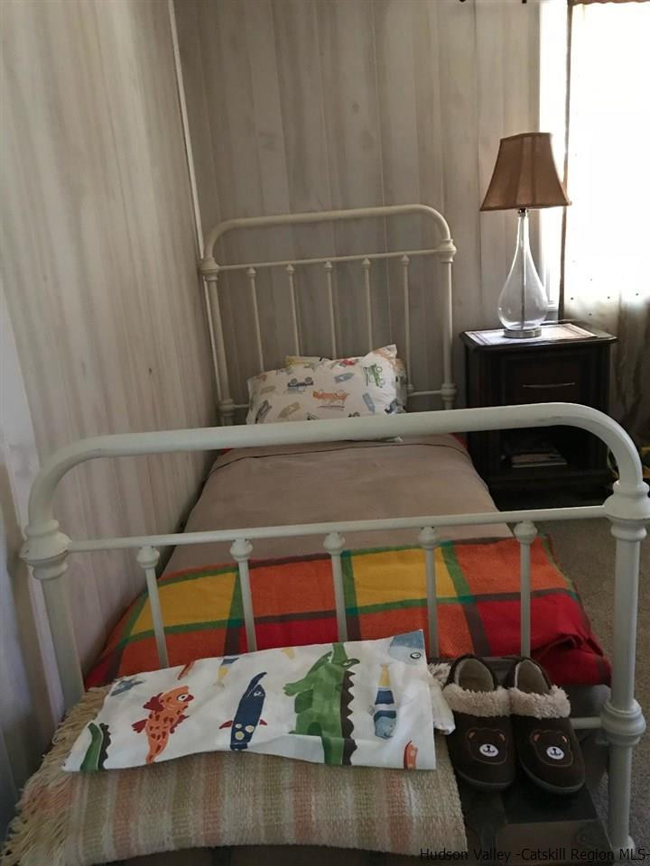 163 Churchland Road Saugerties, NY 12477 - Photo 9 of 20 a room with toys and a table