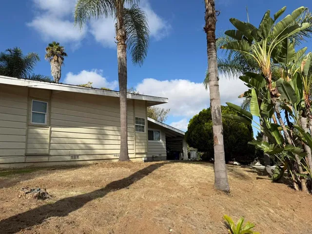 a front view of a house with a garage