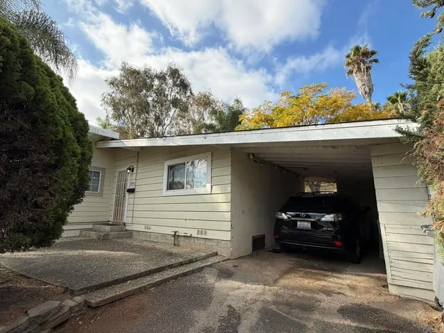 a front view of a building with street view
