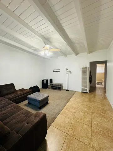 a bedroom with a bed and a walk in closet