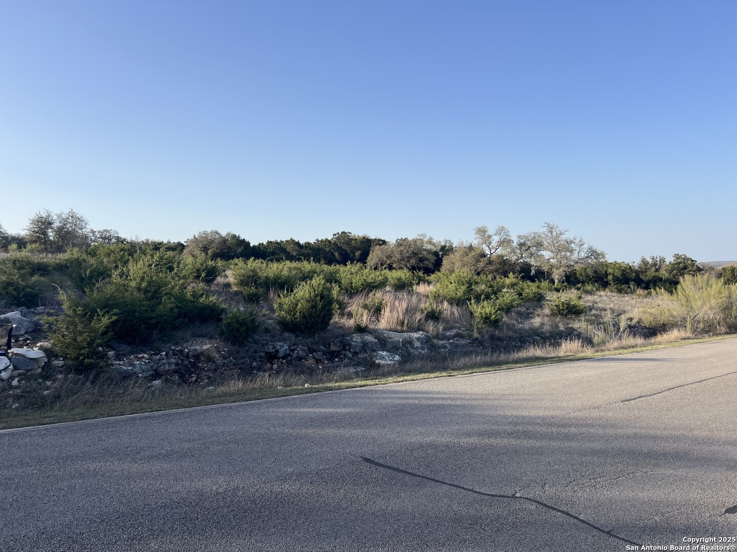 27407 Sunset Loop San Antonio, TX 78266 - Photo 27 of 36 an outdoor view with a road