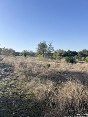 a view of a lake with houses in outdoor space