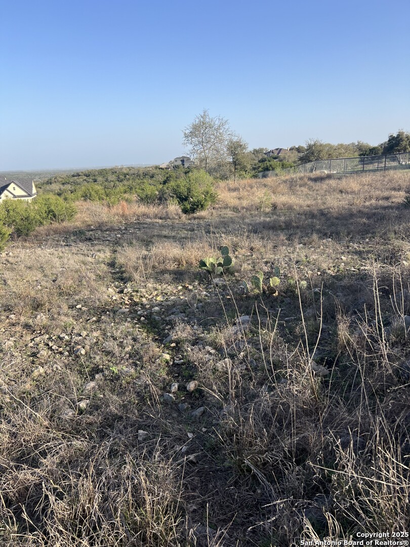 27407 Sunset Loop San Antonio, TX 78266 - Photo 9 of 36 a view of an outdoor space and a mountain view