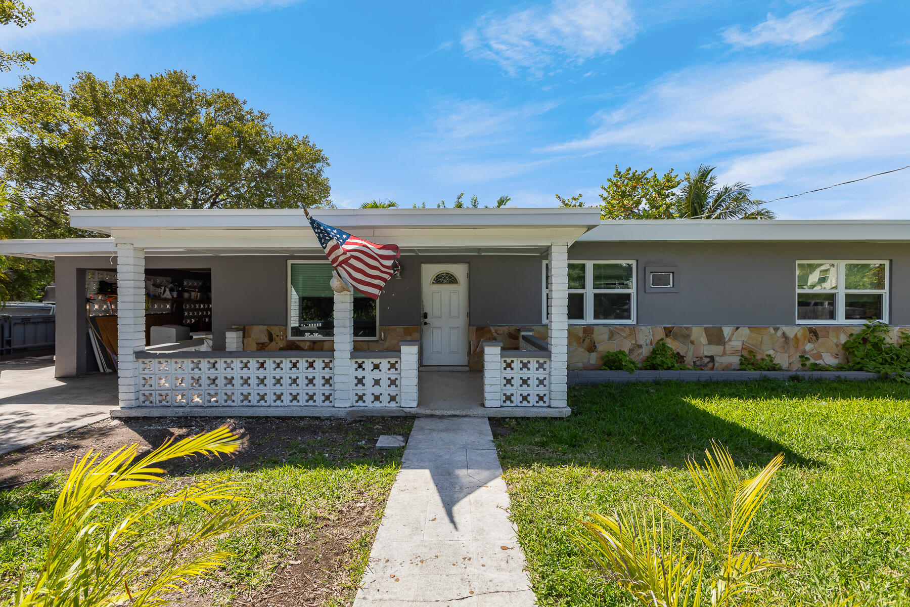 201 4th Street Key West, FL 33040 - Photo 3 of 19 front view of house with a yard