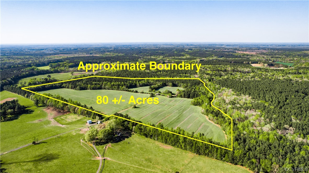 a view of a swimming pool and an outdoor seating