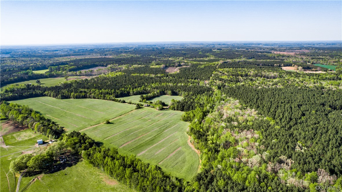 2293 Chalk Level Road, Unit OFF Alberta, VA 23821 - Photo 5 of 50 a view of a lush green field with mountains in the background