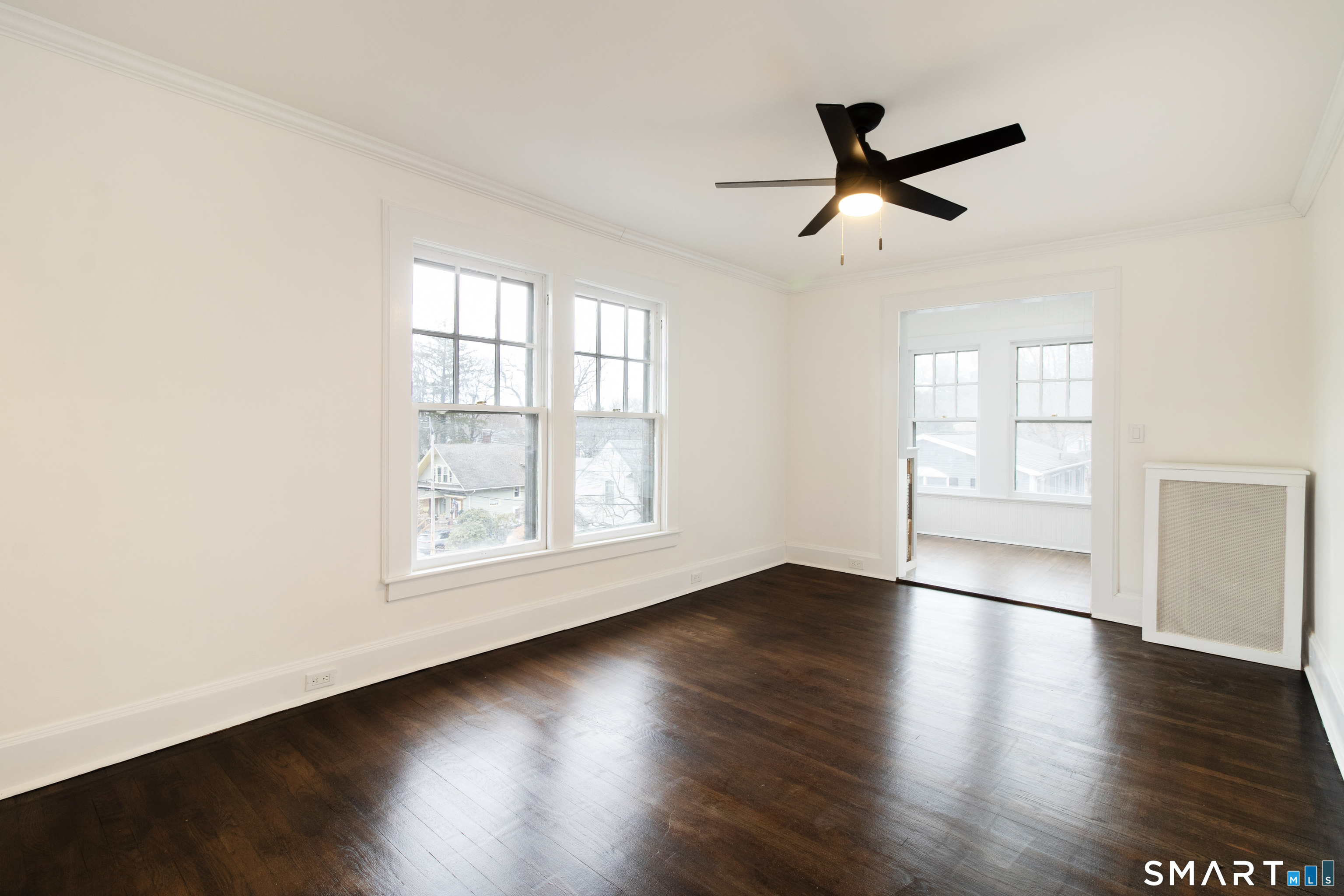 33 Julian Terrace Norwich, CT 06360 - Photo 15 of 36 a view of empty room with wooden floor and fan