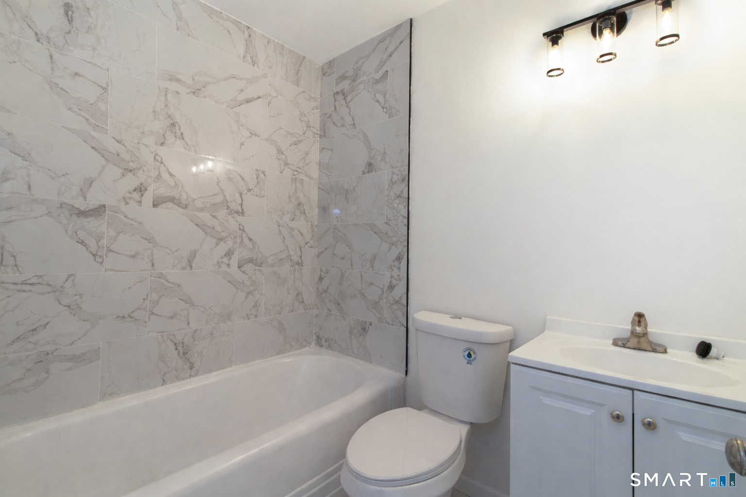 33 Julian Terrace Norwich, CT 06360 - Photo 28 of 36 a bathroom with a toilet and a bathtub