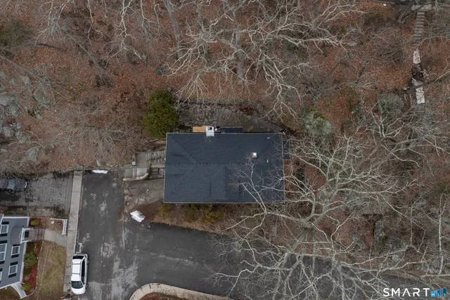an aerial view of residential house with parking space