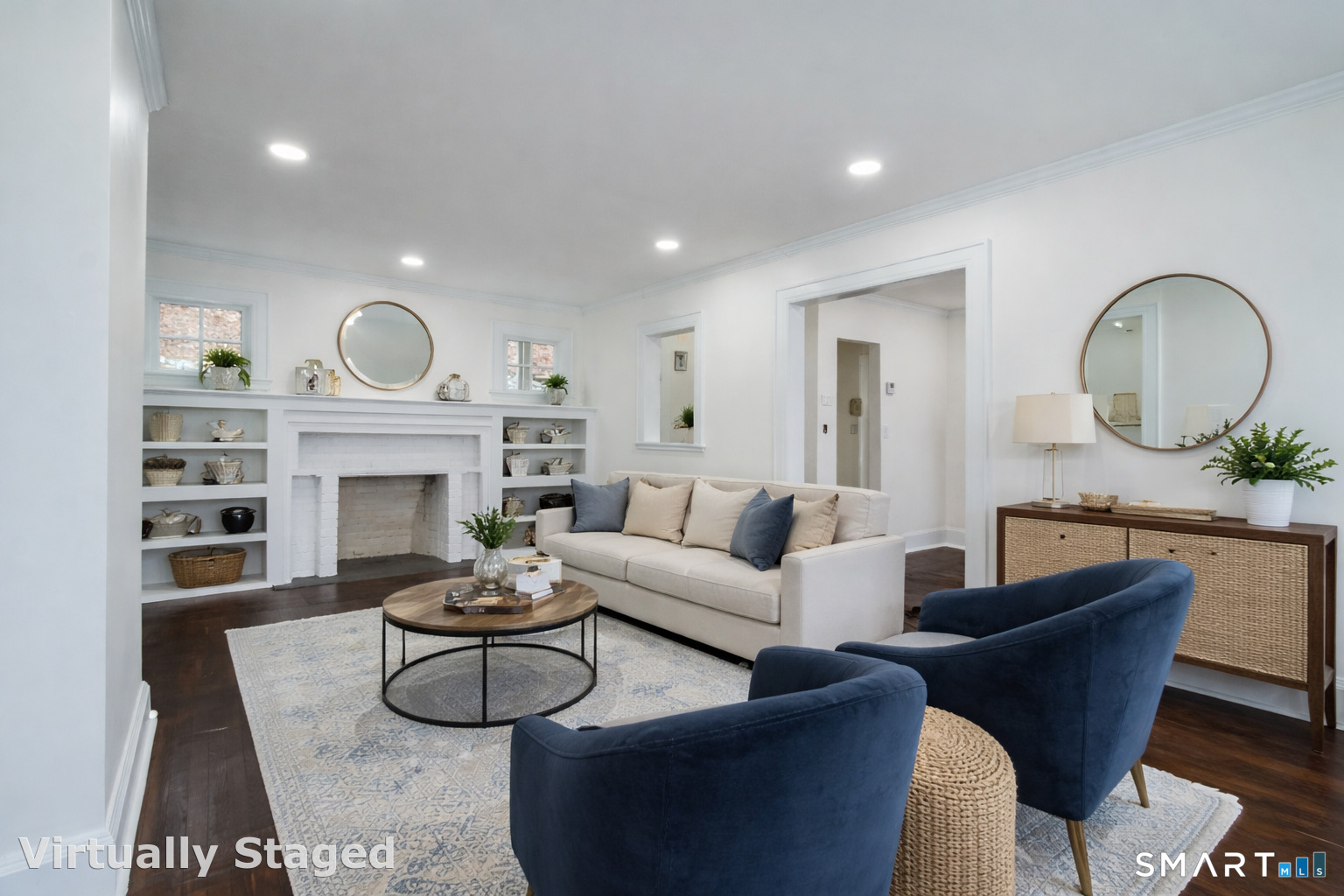 33 Julian Terrace Norwich, CT 06360 - Photo 34 of 36 a living room with furniture a fireplace and a large mirror