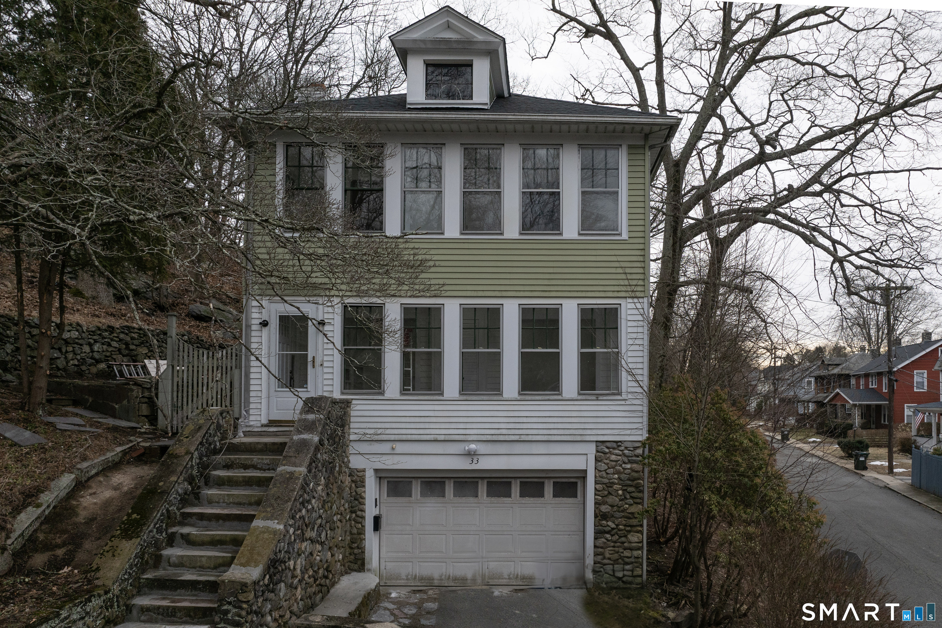 33 Julian Terrace Norwich, CT 06360 - Photo 5 of 36 a front view of a house with a yard