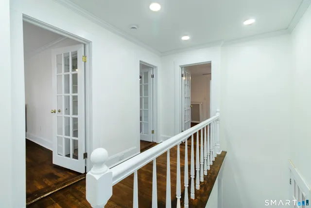 a view of a hallway with entryway