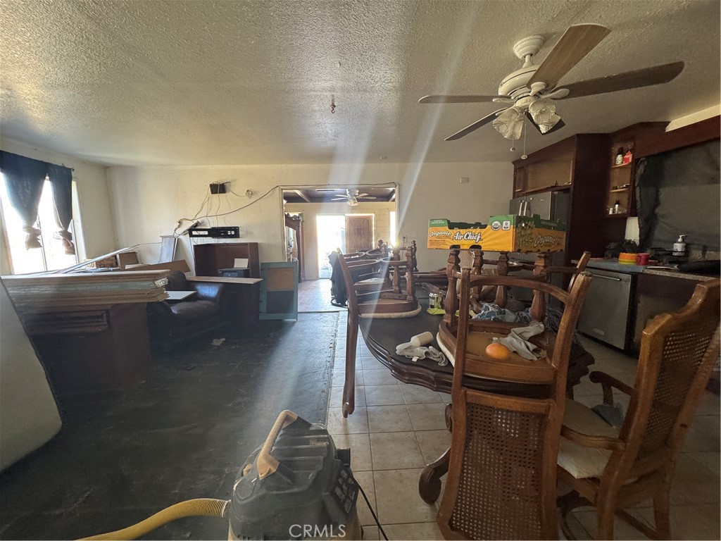 10175 Valle Vista Road Phelan, CA 92371 - Photo 11 of 27 a view of a dining room with furniture