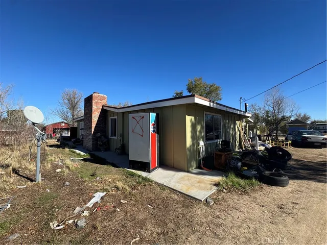 a view of a house with a patio
