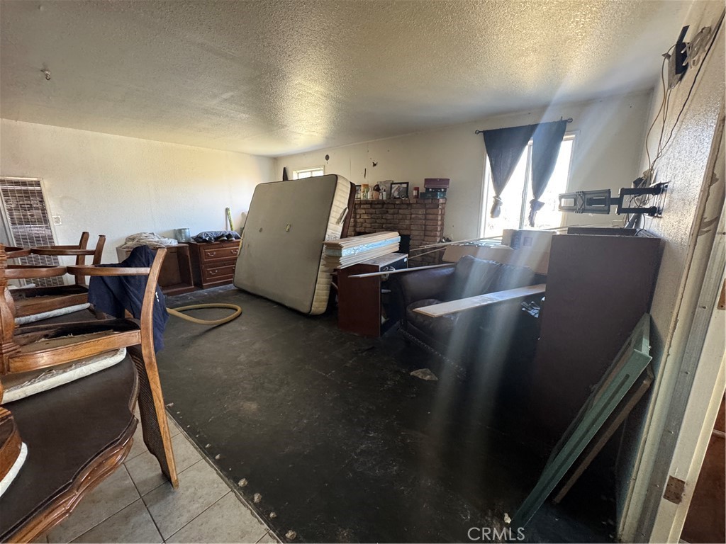 10175 Valle Vista Road Phelan, CA 92371 - Photo 8 of 27 a living room with furniture