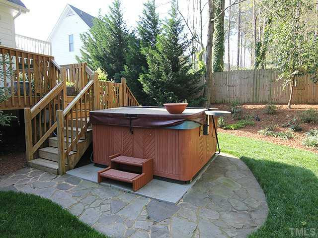 1623 Weatherford Circle Raleigh, NC 27604 - Photo 22 of 25 Soak in your own backyard hot tub. It does remain with the house. Back yard even has misting system to protect from mosquitos. Other
