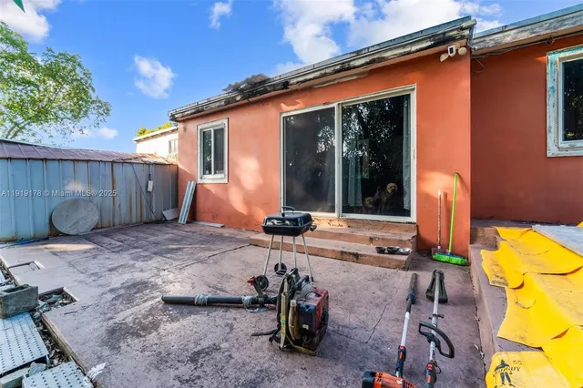 a house view with a backyard space