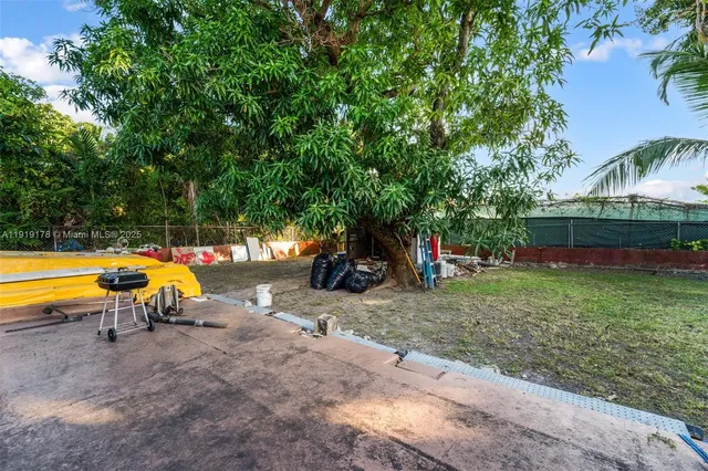 a view of outdoor space with swimming pool