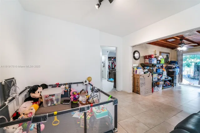 a view of a garage with rack and bicycle
