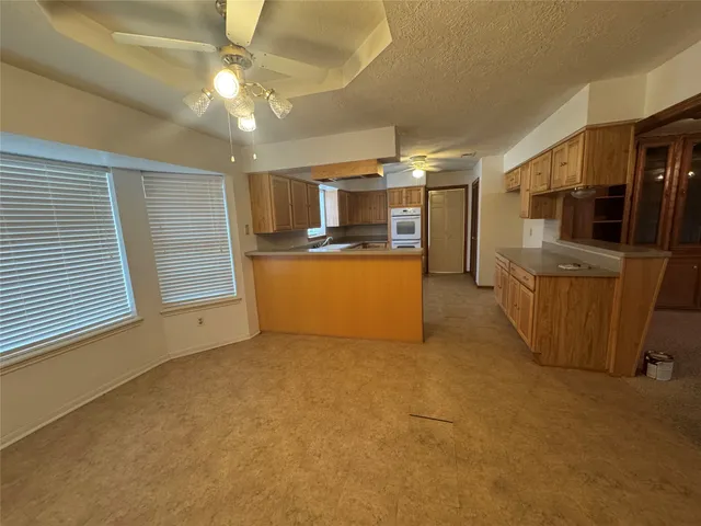 a view of a kitchen with a sink