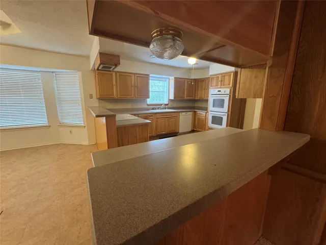 a view of a kitchen with a stove