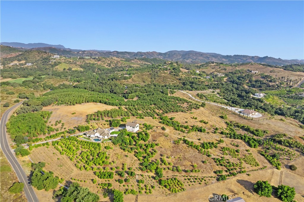 23505 Carancho Road Temecula, CA 92590 - Photo 3 of 73 a view of a lake with mountains in the background