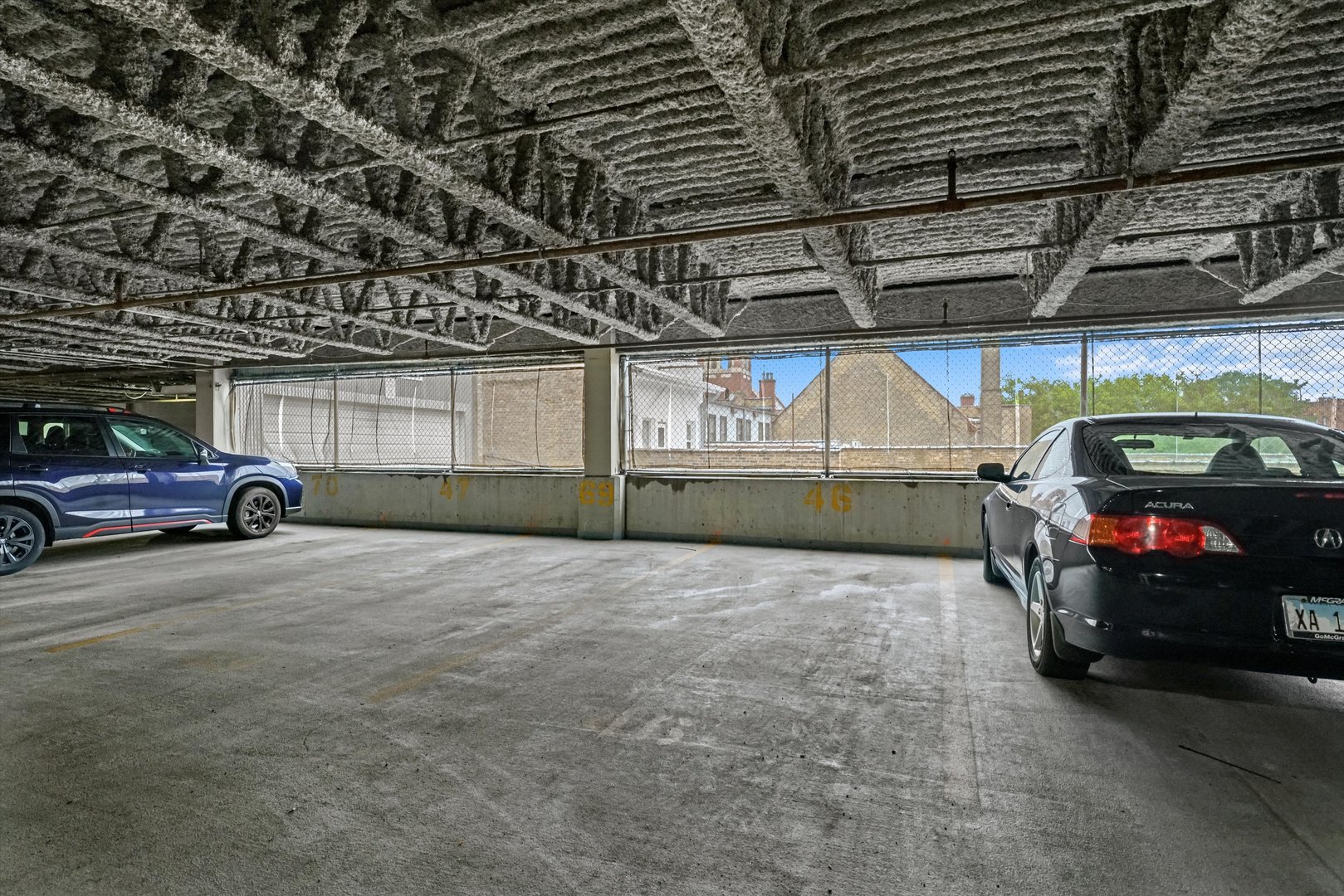 515 Main Street, Unit 307 Evanston, IL 60202 - Photo 17 of 29 a view of garage with cars