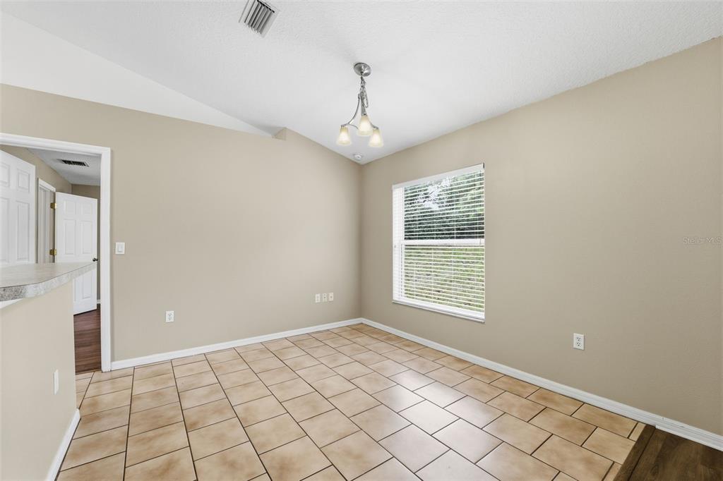 13477 Amanda Avenue Spring Hill, FL 34609 - Photo 13 of 46 a view of an empty room with window