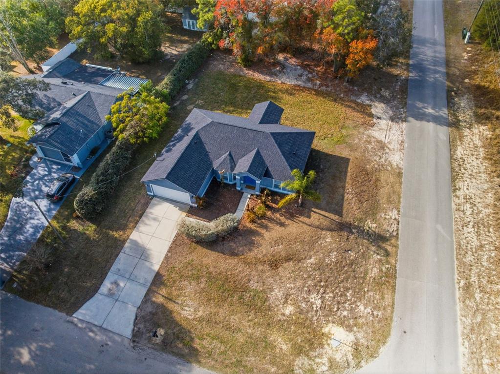13477 Amanda Avenue Spring Hill, FL 34609 - Photo 28 of 46 a view of house with yard
