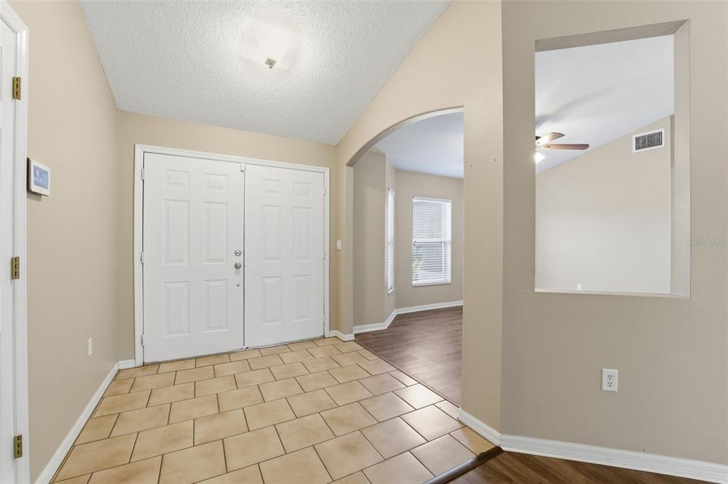13477 Amanda Avenue Spring Hill, FL 34609 - Photo 4 of 46 wooden floor in a room with a window